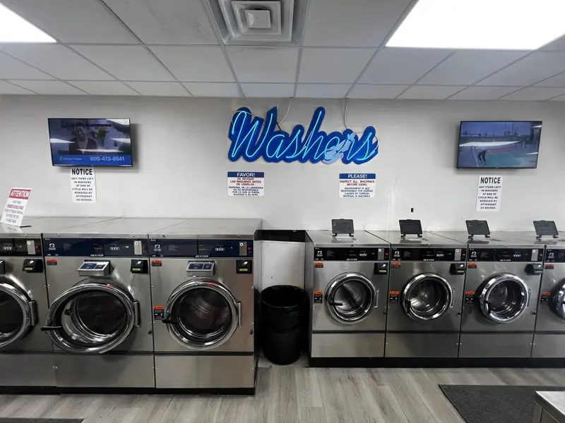 Suds Laundromat Surprise AZ interior with Dexter washers and neon Washers sign